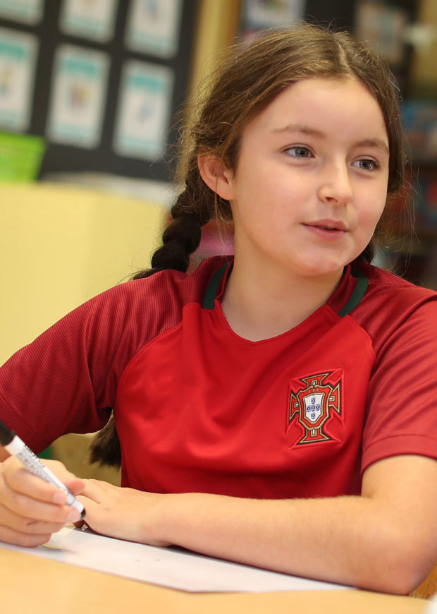 Close up of student observing in class